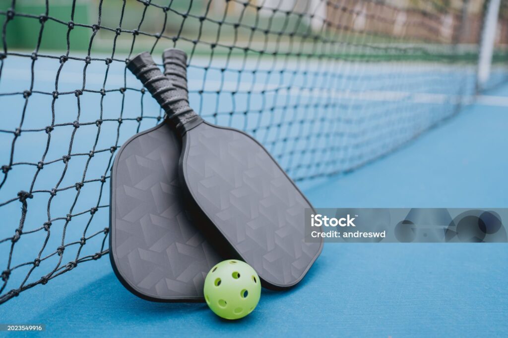 pickleball racket and ball
